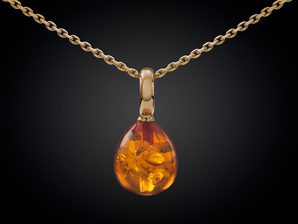 Snoepjes | 14 karaat geelgouden hanger met barnsteen (groot oog)