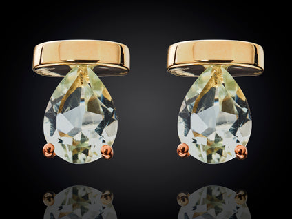 Zonsopgang | 14 karaat geel- met witgouden spangarmband met peer geslepen Prasioliet en Diamant